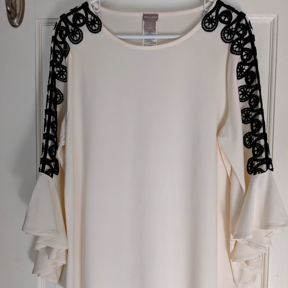 Chico's white top with black embellishment and "drama" sleeves Size 2
